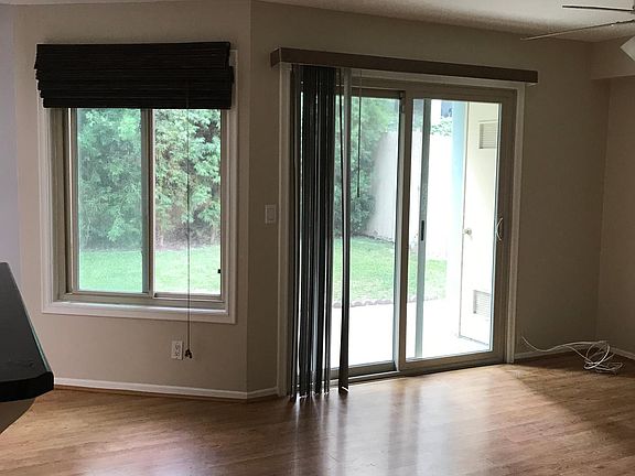 View from living room to patio and yard.