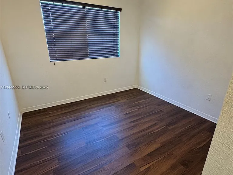 10870 NW 88th Ter #208 — Photo 32