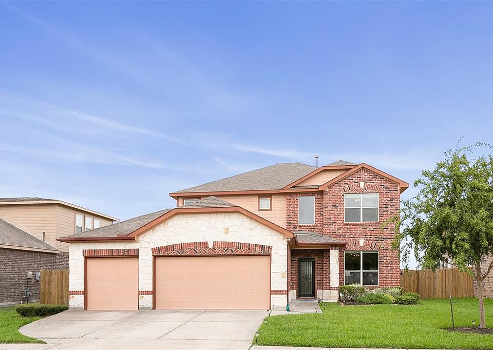 Welcome home. Wide driveway leads to a 3 car garage with epoxy floors, insulated garage doors and storage cabinets.