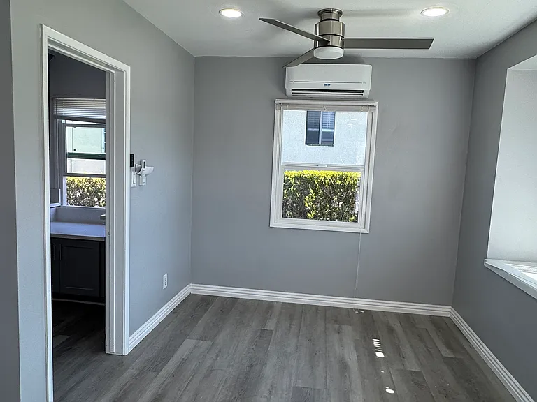 Freshly Painted Interior with New Baseboards