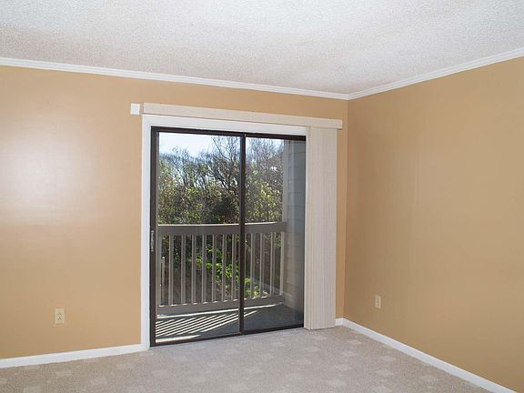 Principal bedroom with small private balcony
