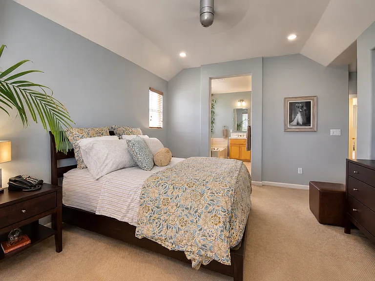 Primary suite with generous natural light and spacious layout.