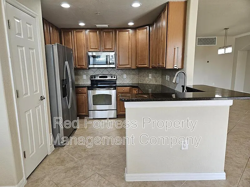 Building Photo - 17451 Old Harmony Dr #102