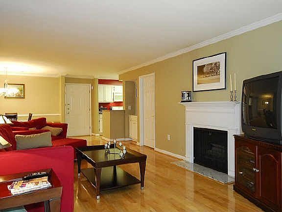 Another view of the extra large living room. Freshly painted designer colors.