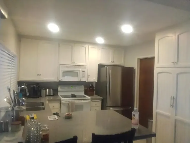 Kitchen before new stove and microwave were installed