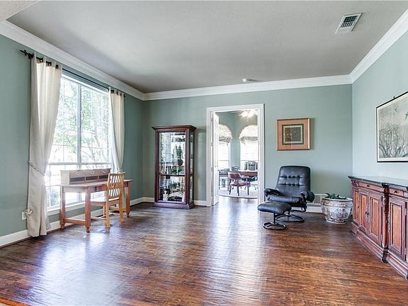 Spacious, Split Formal Living Room with Hardwoods, High Ceiling, Crown and Base Molding,
