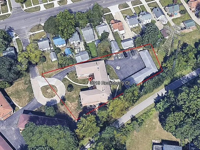 Property is outlined in red. Note paved walking trail is within walking distance.