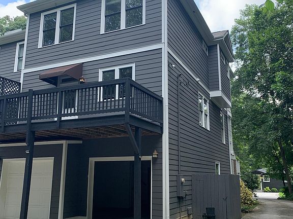 Two car garage and side view.