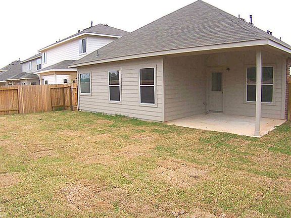 large yard with covered patio