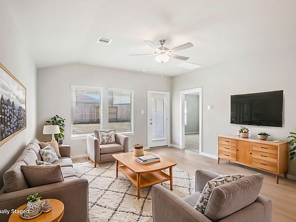 The Sequoia plan in Pine Lake Cove of Conroe, TX.