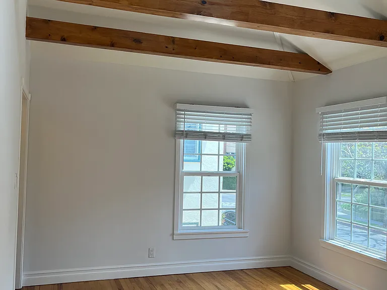 MAIN ROOM: HARDWOOD FLOORS & WOOD BEAMS