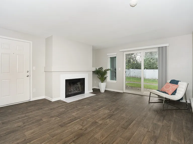 Novela Apartments Living Space with Fireplace