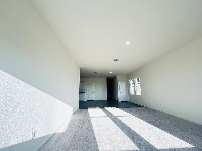 Living Room, Dining Area, coat closet and garage entrance