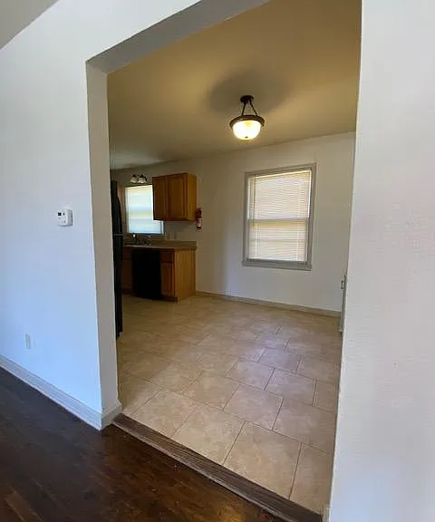 view of dining area and kitchen from living room