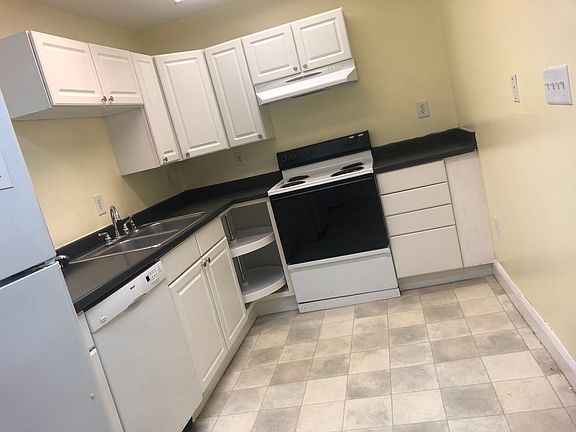 Kitchen, electric range, refrigerator, dishwasher