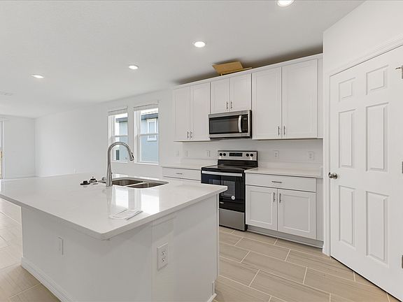 Kitchen in the Daphne floorplan at 756 Griffon Avenue