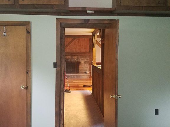 Hallway leading into bedroom.