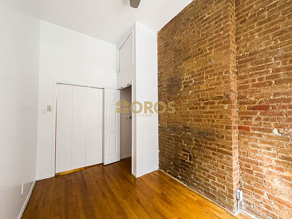 5th image of 215 E 10th St APT 2
