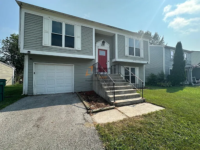 1031 W 59th Pl — Photo 1