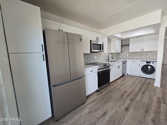 2nd image of 4848 N Woodmere Fairway APT 16