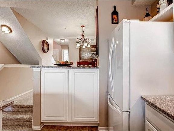 in kitchen looking over into dining area