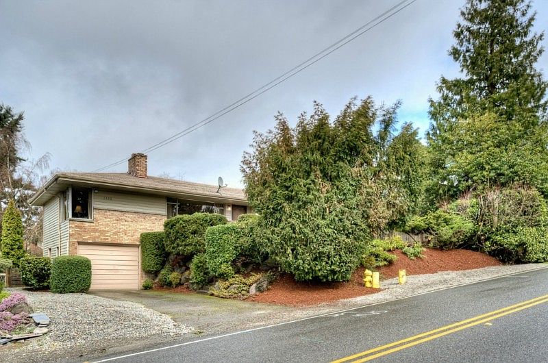 Designer updated mid-century modern house in Shorewood above the Sound.