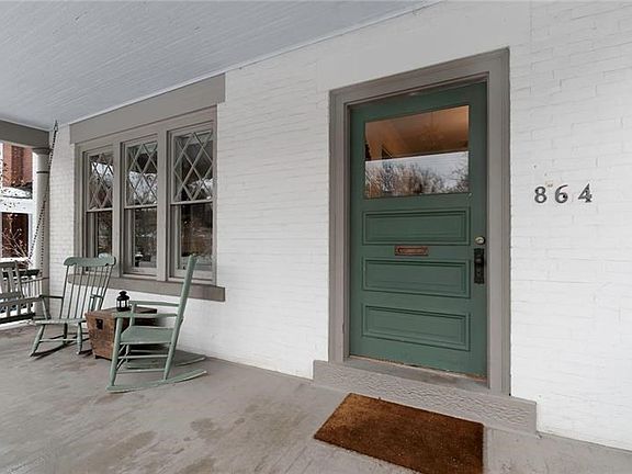 Wide Front Porch to Enjoy the Sights and Sounds of Village Life