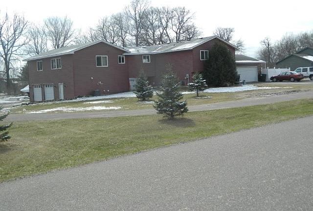5Bedroom, 3Bath, 5Car heated garage. on 1 acre. Separate 2 Bedroom mother-in -law apartment with elevator.