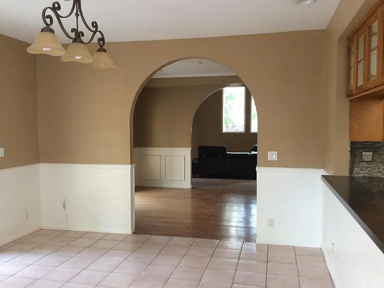 Family room off kitchen with French doors.