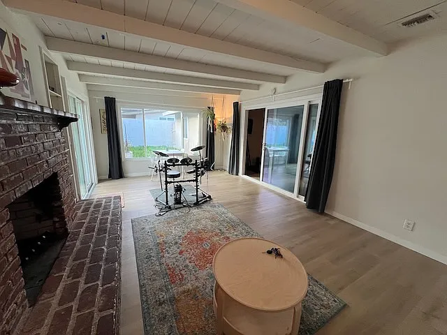 Back Living Room (note, electronic drum set will be removed, and new couch coming soon)