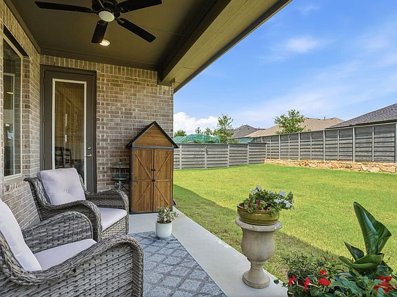 Peaceful & tranquil describes this backyard--ready for morning coffee or an evening nightcap--this east facing backyard offers morning sun & afternoon shade!
