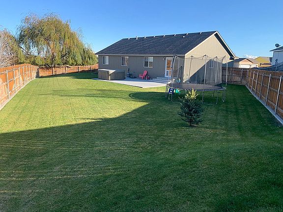Large back yard with patio
