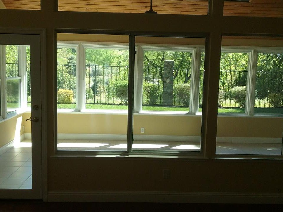 Sunroom looks out over the beautiful greenbelt with no obstructions.