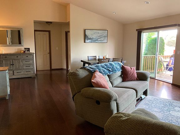 Open-concept living room. PLEASE NOTE: This property does not come furnished.