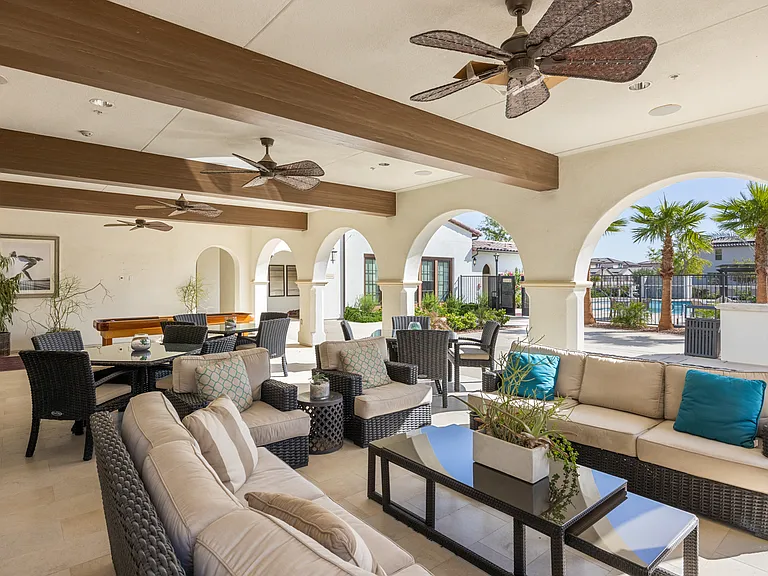 Plenty of cozy seating available for you to enjoy screen time from the outdoor smart TV.