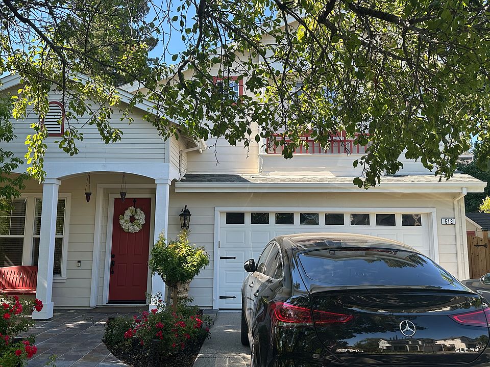Two car garage and expanded driveway that fits 3 cars