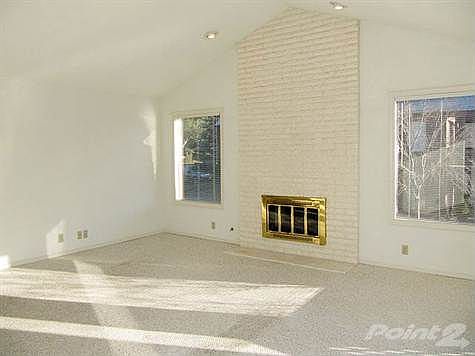 Bright Upper Unit with Vaulted Ceiling