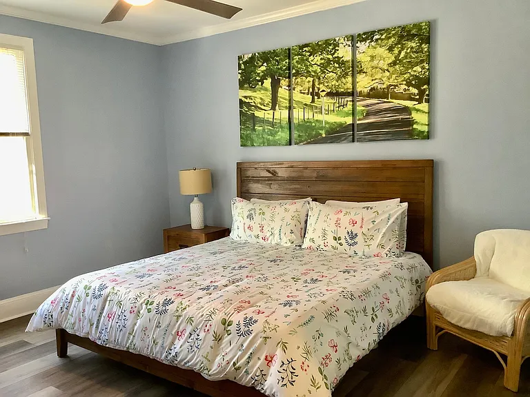 2nd bedroom downstairs king size comfortable bed! with adjoining bathroom