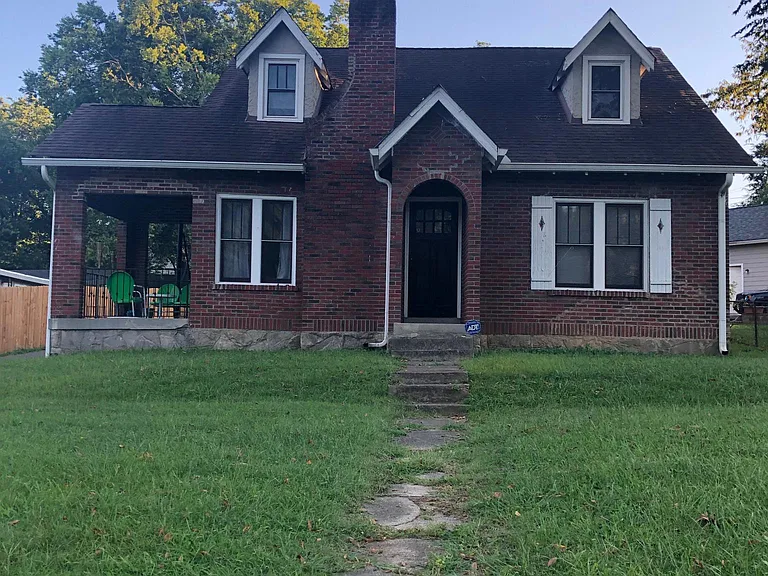 1940'2 Brick Tudor Home