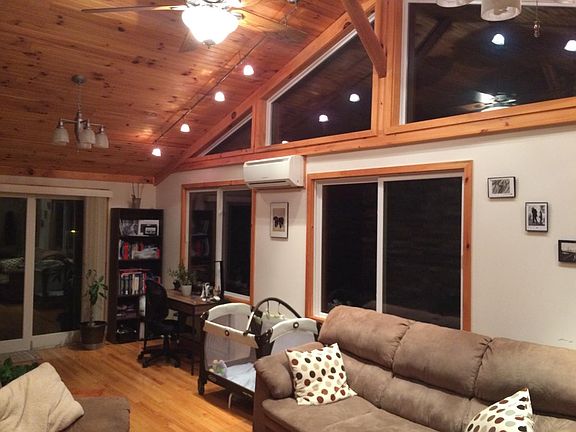 Sunroom leading onto upper deck