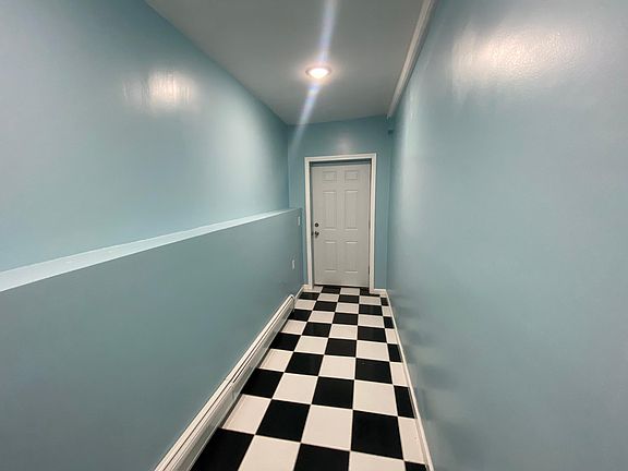 Hallway leading to front entrance