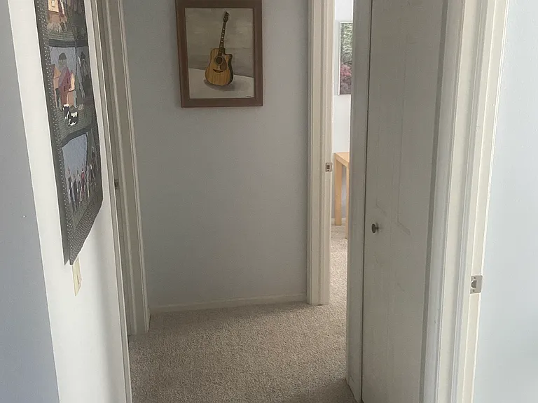 bathroom on left, two rooms on the right