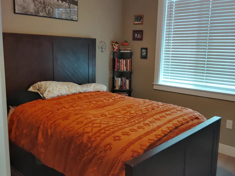 Bedroom can fit a California King Size Bed and Frame + dresser + end table