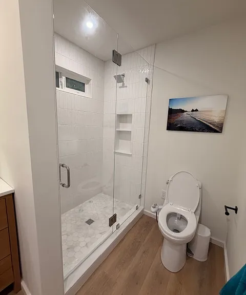 Bathroom has ample storage, washer and dryer and closet