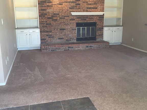 Livingroom with fireplace from front door