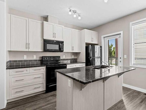 4th image of 125 W Caribou Cres #702-RED
