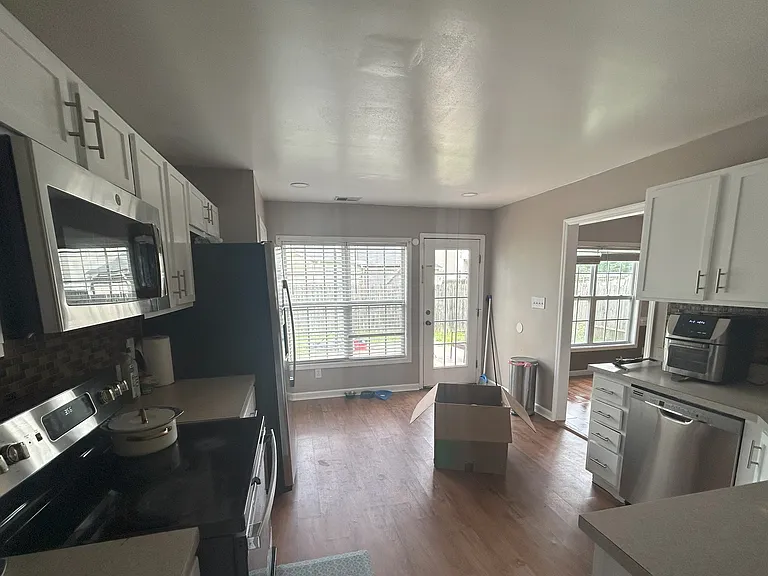 Kitchen, and breakfast nook... to the right at the end entryway to the dining room