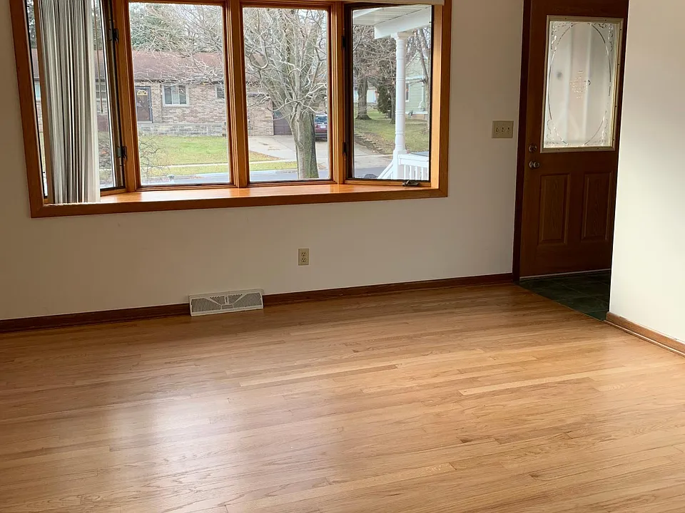 Living room with bay window.