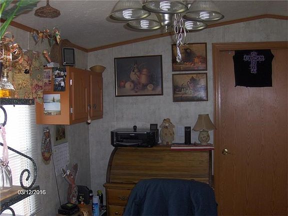 Desk is actually where the dining area is in the kitchen.