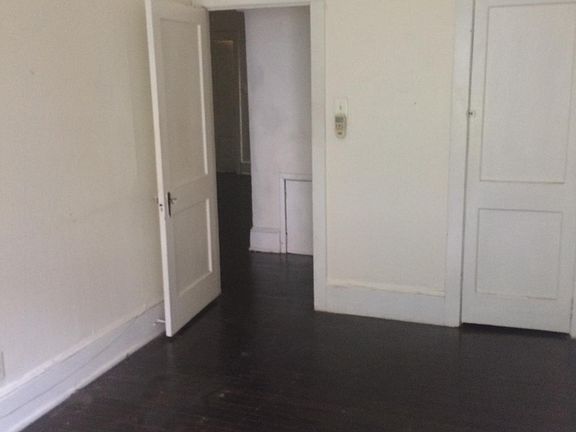 One of two bedrooms with closet